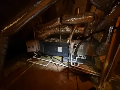 Attic ductwork inspected during a duct cleaning service