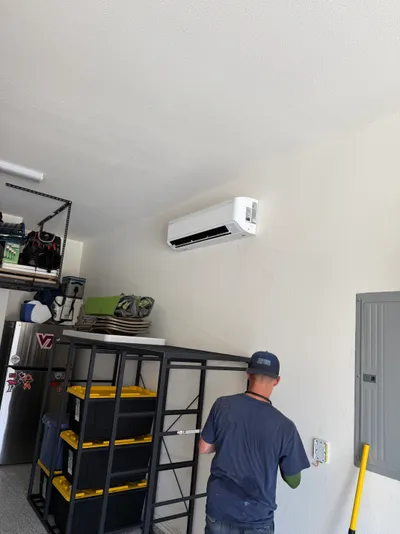 Ductless mini-split indoor unit installed in a garage